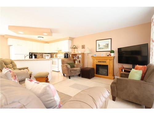 266 Pebble Beach Parkway, Grand Bend, ON - Indoor Photo Showing Living Room With Fireplace