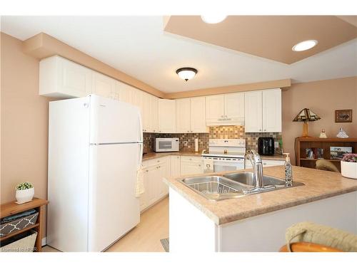 266 Pebble Beach Parkway, Grand Bend, ON - Indoor Photo Showing Kitchen With Double Sink