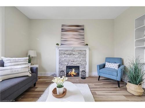 1 Milton Avenue, Hamilton, ON - Indoor Photo Showing Living Room With Fireplace