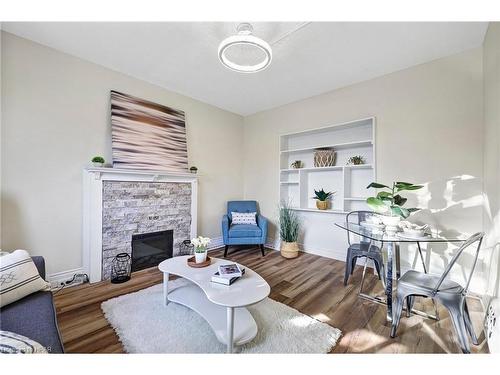 1 Milton Avenue, Hamilton, ON - Indoor Photo Showing Living Room With Fireplace