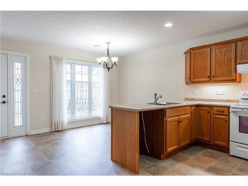 7-20 Huron Street N, St. Marys, ON - Indoor Photo Showing Kitchen With Double Sink