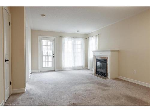 7-20 Huron Street N, St. Marys, ON - Indoor Photo Showing Living Room With Fireplace