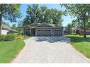 10138 Merrywood Drive, Grand Bend, ON  - Outdoor With Facade 