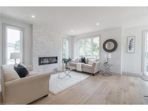 104 Greene Street, Exeter, ON - Indoor Photo Showing Living Room With Fireplace