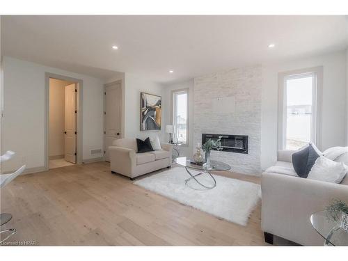 104 Greene Street, Exeter, ON - Indoor Photo Showing Living Room With Fireplace