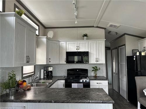 H-12-100 North Harbour Road W, Goderich, ON - Indoor Photo Showing Kitchen With Double Sink