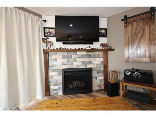 34486 Gore Road, South Huron (Munic), ON - Indoor Photo Showing Living Room With Fireplace