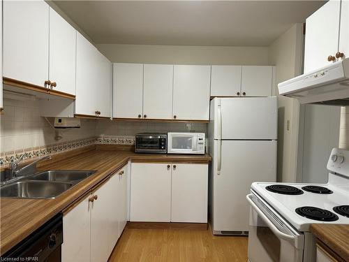 304-97 Huron Street, Stratford, ON - Indoor Photo Showing Kitchen With Double Sink