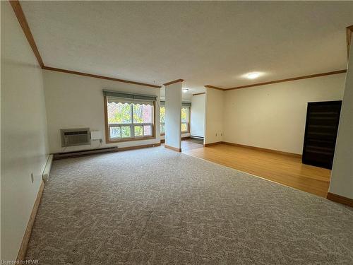 304-97 Huron Street, Stratford, ON - Indoor Photo Showing Other Room With Fireplace