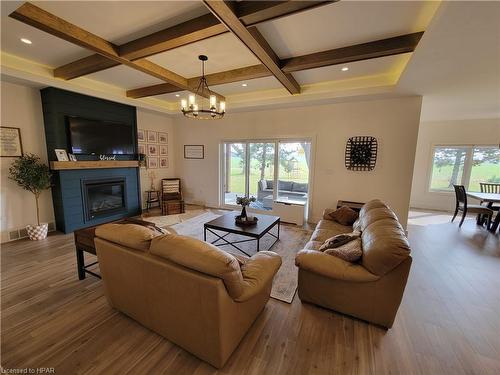 4557 Perth Road 180, Dublin, ON - Indoor Photo Showing Living Room With Fireplace