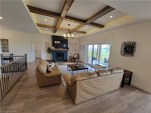 4557 Perth Road 180, Dublin, ON - Indoor Photo Showing Living Room With Fireplace