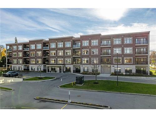 405-235 John Street N, Stratford, ON - Outdoor With Balcony With Facade