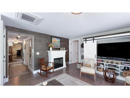 100-5 Cobourg Street, Goderich, ON - Indoor Photo Showing Living Room With Fireplace