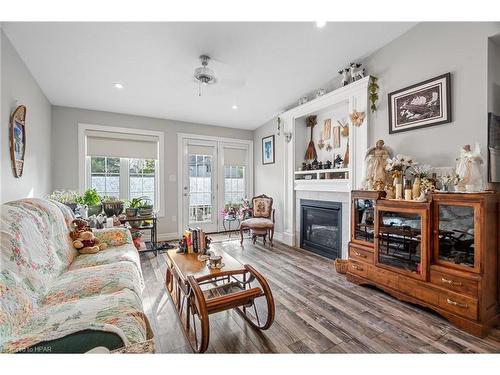 45 Devon Drive, Exeter, ON - Indoor Photo Showing Living Room With Fireplace