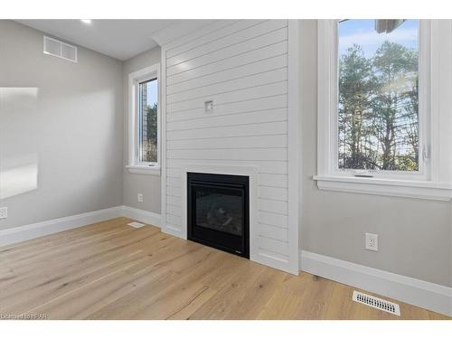 42 Avery Place, Milverton, ON - Indoor Photo Showing Other Room With Fireplace