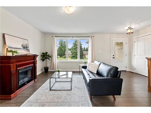 39 Minto Street S, Clifford, ON - Indoor Photo Showing Living Room With Fireplace