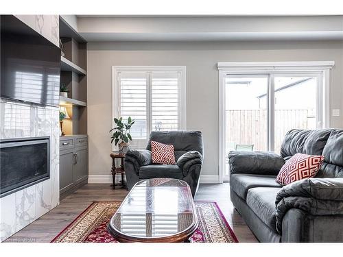 73 Robertson Drive, Stratford, ON - Indoor Photo Showing Living Room With Fireplace