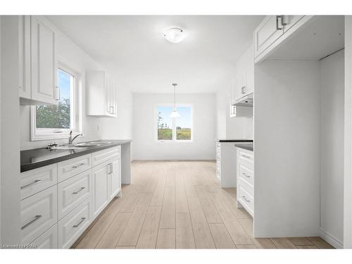 113 Delong Drive, Norwich, ON - Indoor Photo Showing Kitchen With Double Sink