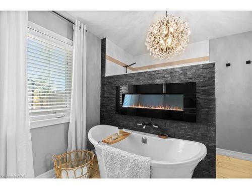 125 Armstrong Street W, Listowel, ON - Indoor Photo Showing Bathroom With Fireplace