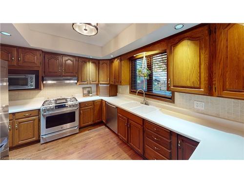 7885 Beaverdams Road, Niagara Falls, ON - Indoor Photo Showing Kitchen With Double Sink