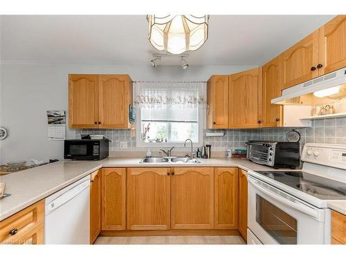 5 Pennsylvania Avenue, Wasaga Beach, ON - Indoor Photo Showing Kitchen With Double Sink