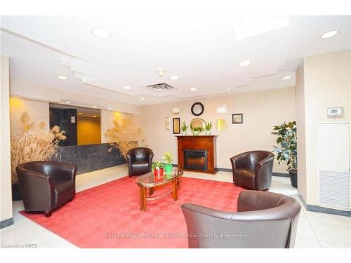 507-300 Webb Drive, Mississauga, ON - Indoor With Fireplace