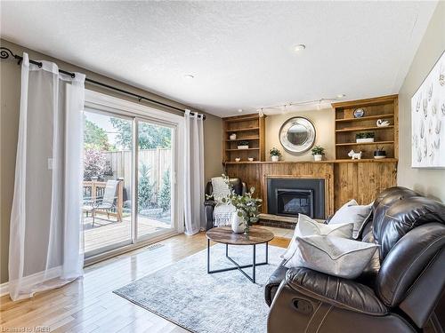 100 Warren Road, Kitchener, ON - Indoor Photo Showing Living Room With Fireplace