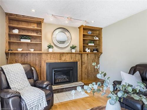 100 Warren Road, Kitchener, ON - Indoor Photo Showing Living Room With Fireplace