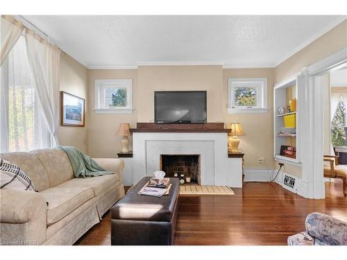 103 Main Street, St. Catharines, ON - Indoor Photo Showing Living Room With Fireplace