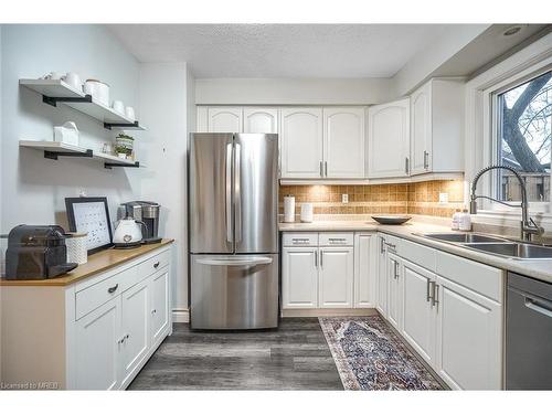 10-2185 Fairchild Boulevard, Burlington, ON - Indoor Photo Showing Kitchen With Double Sink