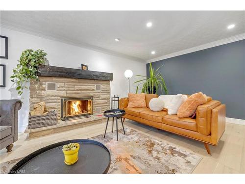 107 Kennedy Avenue, Hamilton, ON - Indoor Photo Showing Living Room With Fireplace