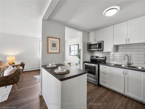 A202-135 Atherley Road, Orillia, ON - Indoor Photo Showing Kitchen With Double Sink