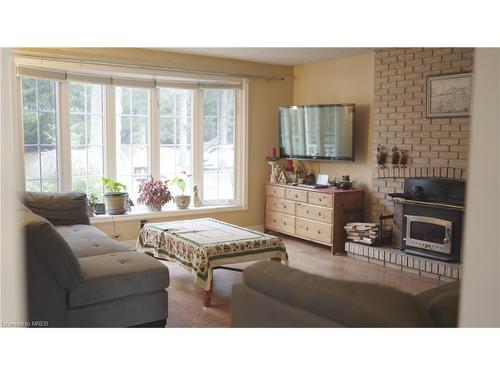 12536 Fifth Line, Milton, ON - Indoor Photo Showing Living Room With Fireplace