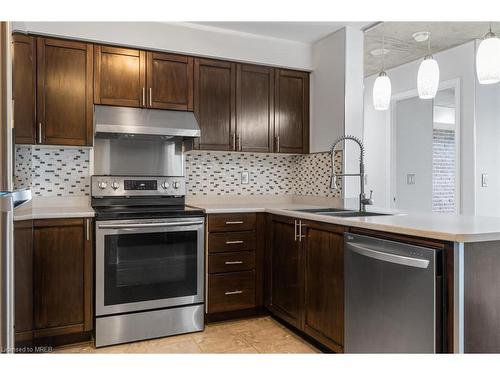 702-2545 Erin Centre Boulevard, Mississauga, ON - Indoor Photo Showing Kitchen With Upgraded Kitchen