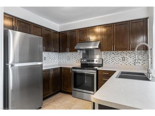 702-2545 Erin Centre Boulevard, Mississauga, ON - Indoor Photo Showing Kitchen With Double Sink With Upgraded Kitchen
