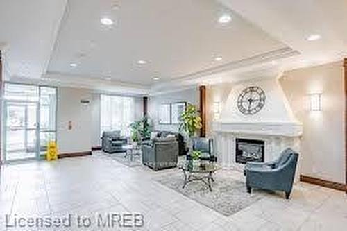 702-2545 Erin Centre Boulevard, Mississauga, ON - Indoor With Fireplace