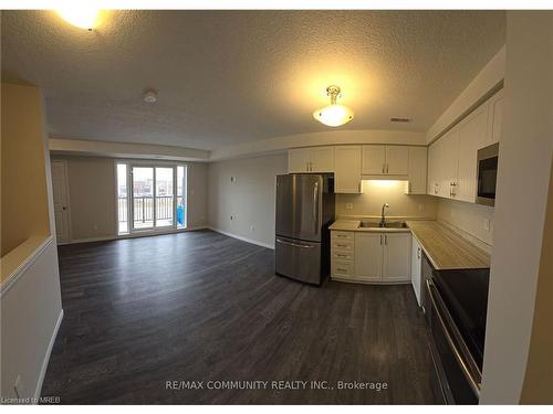 B-1696 Fischer Hallman Road, Kitchener, ON - Indoor Photo Showing Kitchen With Double Sink