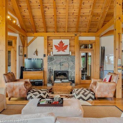 65 B321 Pt. Frying Pan Island, Parry Sound, ON - Indoor Photo Showing Living Room With Fireplace