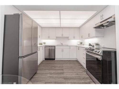 604-2170 Marine Drive, Oakville, ON - Indoor Photo Showing Kitchen With Upgraded Kitchen