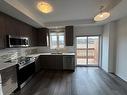 50-5000 Conner Drive, Beamsville, ON  - Indoor Photo Showing Kitchen With Double Sink 
