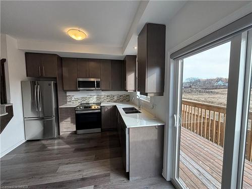50-5000 Conner Drive, Beamsville, ON - Indoor Photo Showing Kitchen With Stainless Steel Kitchen With Double Sink