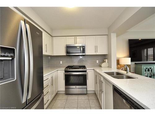 1329 Calais Drive, Woodstock, ON - Indoor Photo Showing Kitchen With Stainless Steel Kitchen With Double Sink