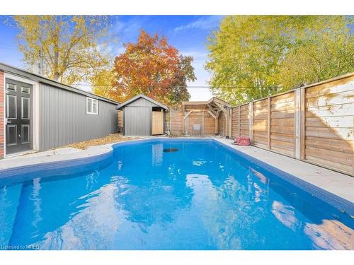 64 Nash Road S, Hamilton, ON - Outdoor With In Ground Pool