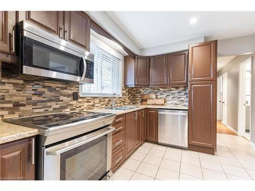 7107 Cadiz Crescent, Mississauga, ON - Indoor Photo Showing Kitchen With Stainless Steel Kitchen With Double Sink