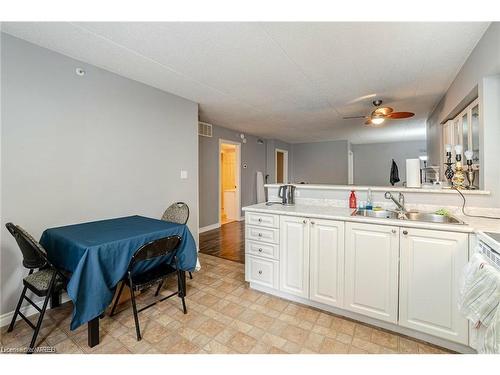 107-4003 Kilmer Drive, Burlington, ON - Indoor Photo Showing Kitchen With Double Sink
