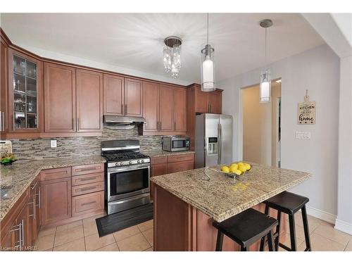 974 Seivert Place, Milton, ON - Indoor Photo Showing Kitchen With Upgraded Kitchen