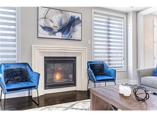 8 Macbean Crescent Street, Waterdown, ON - Indoor Photo Showing Living Room With Fireplace