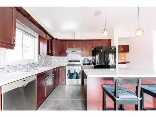 68-7536 Lionshead Avenue, Niagara Falls, ON - Indoor Photo Showing Kitchen With Double Sink