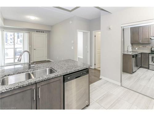 104-620 Sauve Street, Milton, ON - Indoor Photo Showing Kitchen With Double Sink