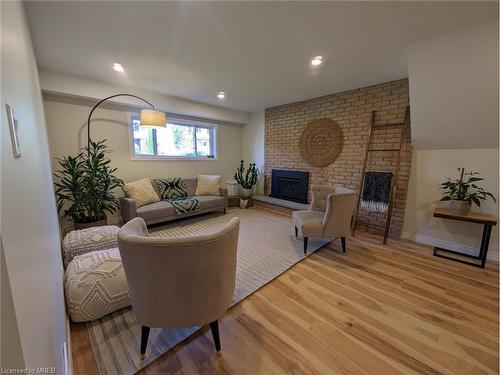 1126 Prince Philip Drive, London, ON - Indoor Photo Showing Living Room With Fireplace